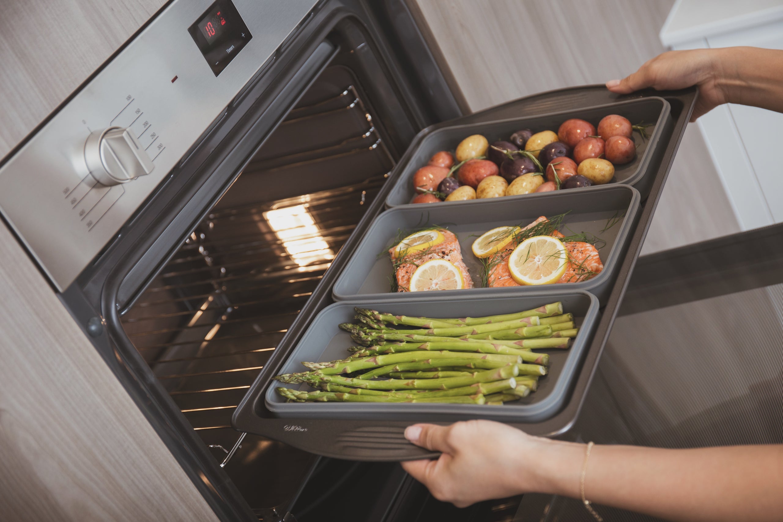 Cook and store with our premium, food-grade platinum silicone trays that are oven-safe, microwave safe, and dishwasher safe. Each tray comes with an air-sealed lid to store all your meals without the mess.You can fit them perfectly on a standard sized half sheet pan to streamline your cooking ingredients. Yay to no more overcooked meals!